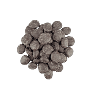 A pile of round, dark chocolate pieces, slightly uneven in texture, arranged on a plain white background. Product: Dark Chocolate Apricots - Cane Sweetened.