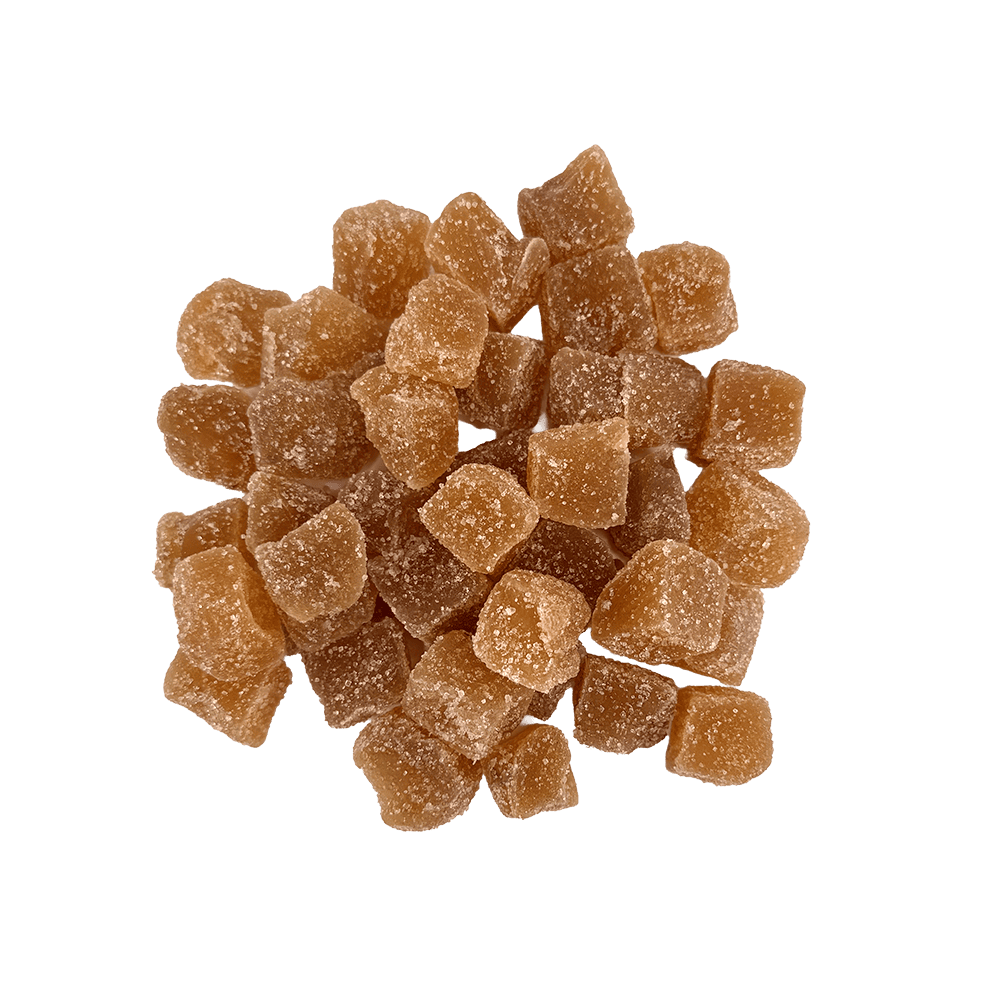 A pile of small, brown, sugar-coated Organic Crystallized Ginger cubes is displayed on a white background.