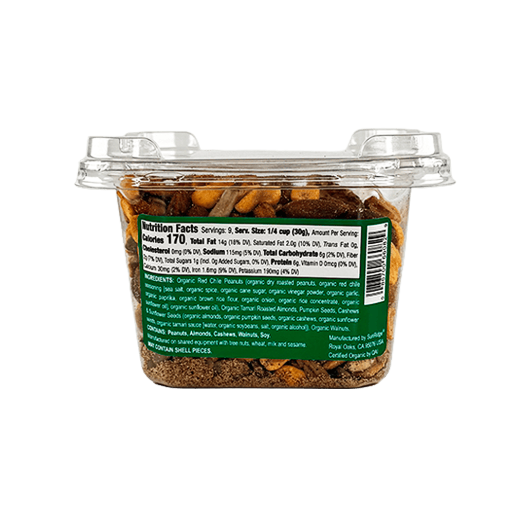 A clear plastic container of Organic Tamari Nuts & Seeds Mix, featuring a nutrition facts and ingredients label on the front.